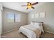 Bedroom features neutral walls, carpet, and a window with a view at 19203 N 39Th Way, Phoenix, AZ 85050
