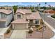 Charming two-story home featuring a tile roof, manicured front yard, and an attached two-car garage at 19203 N 39Th Way, Phoenix, AZ 85050