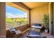 Inviting balcony with comfortable seating and scenic neighborhood views at 19777 N 76Th St # 3229, Scottsdale, AZ 85255