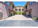 Two-story building with private garages and ample parking space, as well as well-maintained landscaping at 19777 N 76Th St # 3229, Scottsdale, AZ 85255