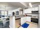 Bright kitchen with stainless steel appliances and a breakfast bar at 19777 N 76Th St # 3229, Scottsdale, AZ 85255