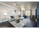 Elegant living room featuring dark wood floors, modern decor, and a plush sectional sofa at 19777 N 76Th St # 3229, Scottsdale, AZ 85255