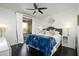 Serene main bedroom with a ceiling fan and access to a private balcony at 19777 N 76Th St # 3229, Scottsdale, AZ 85255
