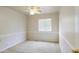 Cozy bedroom with neutral carpet, fresh paint and ample natural light at 206 N 152Nd Ave, Goodyear, AZ 85338