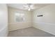 Comfortable bedroom featuring neutral carpet, and a ceiling fan at 206 N 152Nd Ave, Goodyear, AZ 85338