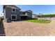 Large, fully-fenced backyard with green grass, trampoline, and swing set perfect for outdoor activities and Gathering fun at 21341 S 227Th Way, Queen Creek, AZ 85142