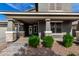 Charming front porch with stone accents, pillars, and a welcoming entrance at 21341 S 227Th Way, Queen Creek, AZ 85142