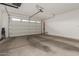 Clean and spacious two-car garage with an automatic door opener providing secure parking and storage at 21341 S 227Th Way, Queen Creek, AZ 85142