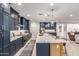 A well-appointed kitchen showcases a large island and open layout at 21341 S 227Th Way, Queen Creek, AZ 85142