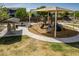 Community playground with shade and updated play structures and equipment at 21341 S 227Th Way, Queen Creek, AZ 85142