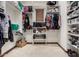 Walk-in closet with custom shelving and ample storage at 21615 E Pegasus Pkwy, Queen Creek, AZ 85142