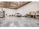 Attached garage with room to park vehicles and space for a workshop at 21615 E Pegasus Pkwy, Queen Creek, AZ 85142