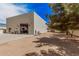 Attached garage with gravel yard at 21615 E Pegasus Pkwy, Queen Creek, AZ 85142