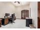 Spacious office with shelving and an exterior entrance at 21615 E Pegasus Pkwy, Queen Creek, AZ 85142