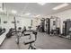 Spacious workout room equipped with weightlifting equipment and fitness machines at 21615 E Pegasus Pkwy, Queen Creek, AZ 85142