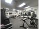 Spacious workout room equipped with weightlifting equipment, mirrors and fitness machines at 21615 E Pegasus Pkwy, Queen Creek, AZ 85142