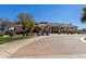Golf clubhouse providing great community space in a landscaped setting with golf bag stand, perfect for leisure and socializing at 2239 S Cottonwood --, Mesa, AZ 85202