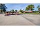 Shot of golf carts lined up on the asphalt in front of the course at 2239 S Cottonwood --, Mesa, AZ 85202