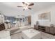 Bright living room featuring a large sectional sofa and stylish decor at 2239 S Cottonwood --, Mesa, AZ 85202