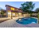 Beautiful blue backyard pool area, along with trees, foliage, home, patio, and fence at 2239 S Cottonwood --, Mesa, AZ 85202