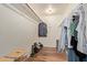 Walk-in closet with wood floor, clothing racks, and shelves at 2305 E Millbrae Ct, Gilbert, AZ 85234
