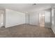 Spacious bedroom with carpet floors, two doors and natural light at 2428 S 246Th Ln, Buckeye, AZ 85326