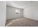 Bedroom featuring carpet and a window at 2428 S 246Th Ln, Buckeye, AZ 85326