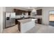 Spacious kitchen featuring stainless steel appliances and a center island at 2428 S 246Th Ln, Buckeye, AZ 85326