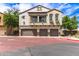 Beautiful three-story townhome featuring a charming balcony and three-car garage at 2727 N Price Rd # 3, Chandler, AZ 85224