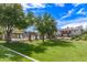 Lush green space, pool, and charming buildings enhance this community at 2727 N Price Rd # 3, Chandler, AZ 85224