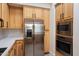 Modern kitchen with stainless steel refrigerator and microwave at 28990 N White Feather Ln # 121, Scottsdale, AZ 85262