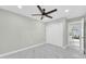 Bright bedroom with white marble floors, ceiling fan and white closet doors at 2926 N 16Th Ave, Phoenix, AZ 85015