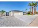 Beautiful home featuring a white exterior, well-maintained landscaping, and a spacious driveway at 2926 N 16Th Ave, Phoenix, AZ 85015