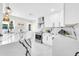 Bright kitchen featuring white cabinets, marble counters, stainless steel appliances, and modern design at 2926 N 16Th Ave, Phoenix, AZ 85015