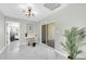 Open floor plan with marble floors, contemporary lighting and sliding glass doors at 2926 N 16Th Ave, Phoenix, AZ 85015