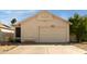 Charming home exterior featuring a well-maintained lawn and attached garage at 3017 E Bluefield Ave, Phoenix, AZ 85032