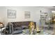 This modern living room has a comfortable sofa, decorative vases and tile flooring at 3017 E Bluefield Ave, Phoenix, AZ 85032