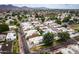 High angle captures lake community with tree-lined streets at 3029 W Sierra St, Phoenix, AZ 85029