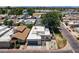 Aerial view of single-story home showcasing desert landscaping, a private courtyard, and mature tree coverage at 3029 W Sierra St, Phoenix, AZ 85029