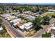 Aerial view of the neighborhood showcasing the lakes, tree coverage, and community ammenities at 3029 W Sierra St, Phoenix, AZ 85029