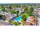 Bird's-eye view showcasing a pool, outdoor seating, and surrounding residential neighborhood at 3029 W Sierra St, Phoenix, AZ 85029