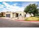 Charming home showcasing desert landscaping, an attached garage, and a well-manicured lawn at 3029 W Sierra St, Phoenix, AZ 85029