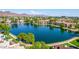 Beautiful aerial view showcasing a serene lake surrounded by lush greenery and well-maintained buildings at 3029 W Sierra St, Phoenix, AZ 85029