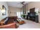 Spacious living room featuring a fireplace, large windows, and comfortable seating at 3029 W Sierra St, Phoenix, AZ 85029