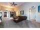 Open living room with a ceiling fan and doorway that leads into the entryway at 3029 W Sierra St, Phoenix, AZ 85029