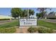 Lake Biltmore Estates sign with tiled design and greenery at 3029 W Sierra St, Phoenix, AZ 85029