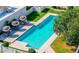 Aerial shot of pool featuring patio seating surrounded by lawn at 3029 W Sierra St, Phoenix, AZ 85029