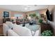 Comfortable living room with lots of natural light, ceiling fan, and neutral color palette at 3117 S Signal Butte Rd # 484, Mesa, AZ 85212