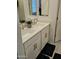 Bright bathroom featuring dual sinks, modern fixtures, and stylish decor at 36354 W San Clemente Ave, Maricopa, AZ 85138