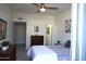 Comfortable bedroom with cool gray floors and walls, complete with modern furniture at 3650 E Montecito Ave # 4, Phoenix, AZ 85018
